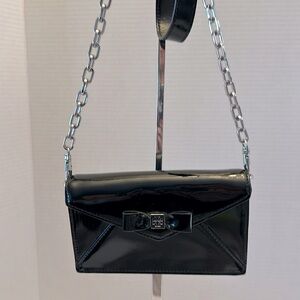 Tory Burch, black patent leather clutch with silver chain strap ￼